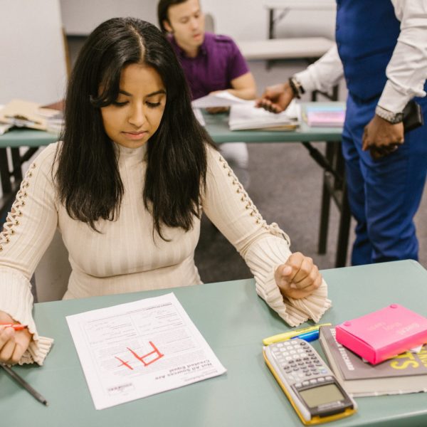 student getting a mark in her exam
